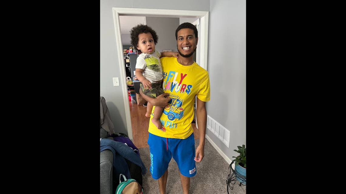 Adam “AJ” Blackstock Jr., right, poses for a photograph with his son. Blackstock was found dead inside his vehicle Jan. 17 in a case Kansas City police are investigating as a homicide.