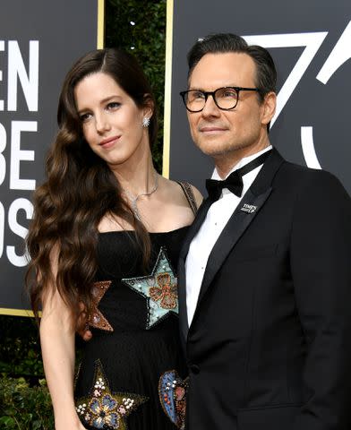<p>VALERIE MACON/AFP via Getty </p> Christian Slater and Brittany Lopez