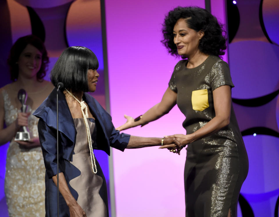 Tracee Ellis Ross, right, presents the lifetime achievement award to Cicely Tyson at the 40th Anniversary Gracies Awards at the Beverly Hilton Hotel on Tuesday, May 19, 2015, in Beverly Hills, Calif. (Photo by Chris Pizzello/Invision/AP)