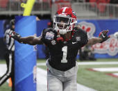 Georgia wide receiver George Pickens reacts to his touchdown against Cincinnati in the first half in the NCAA college football Peach Bowl game on Friday, Jan. 1, 2021, in Atlanta. (Curtis Compton/Atlanta Journal-Constitution via AP)