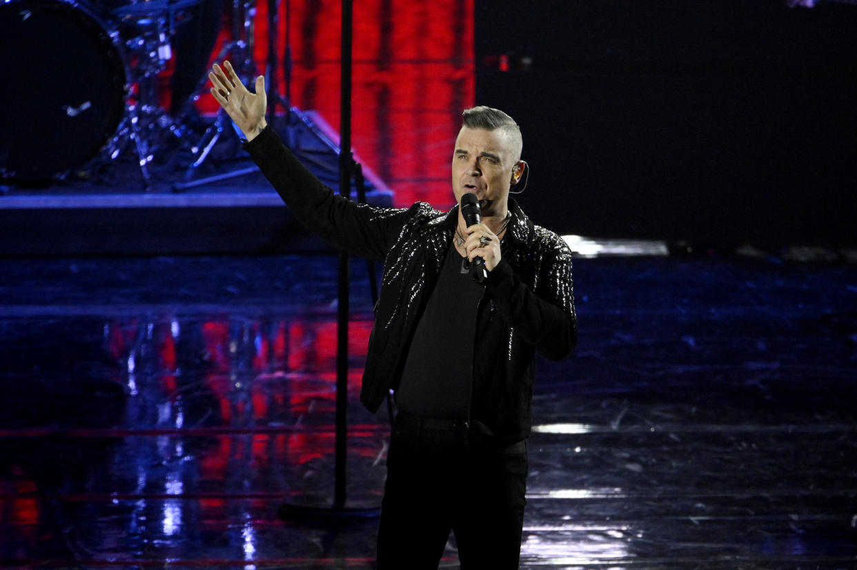 Robbie Williams performs on stage during X Factor 2019 Final at Mediolanum Forum of Assago on December 12, 2019 in Milan, Italy. (Photo by Pietro D'aprano/Getty Images)