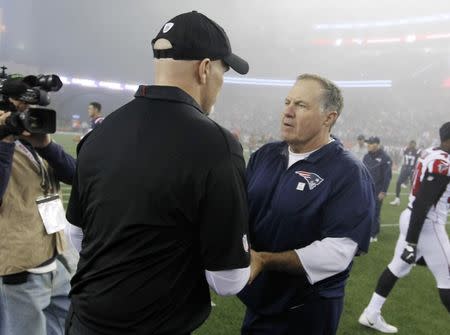 Oct 22, 2017; Foxborough, MA, USA; New England Patriots head coach Bill Belichick shakes hands with Atlanta Falcons head coach Dan Quinn following the game at Gillette Stadium. Mandatory Credit: Stew Milne-USA TODAY Sports