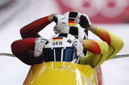 Bobsleigh - Pyeongchang 2018 Winter Olympics - Men's 4-man Competition - Olympic Sliding Centre - Pyeongchang, South Korea - February 24, 2018 - Francesco Friedrich, Candy Bauer, Martin Grothkopp and Thorsten Margis of Germany compete. REUTERS/Edgar Su