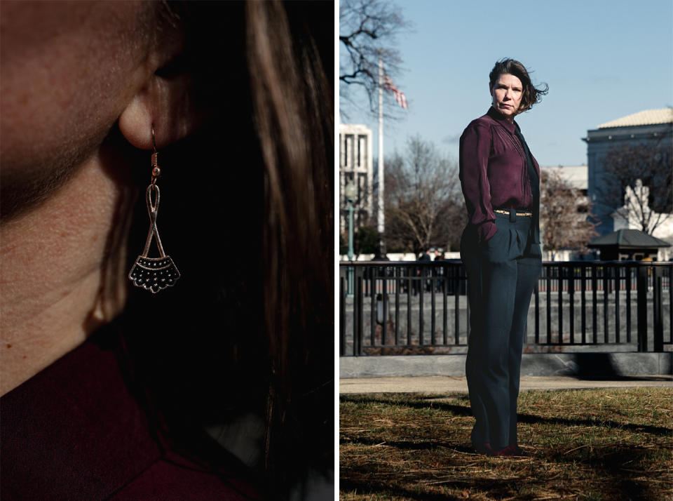 Nicole Enfield, whose earrings are inspired by the late Justice Ruth Bader Ginsburg's distinctive collars, was also arrested for protesting abortion law changes during a Supreme Court hearing in November. (Shuran Huang for NBC News)