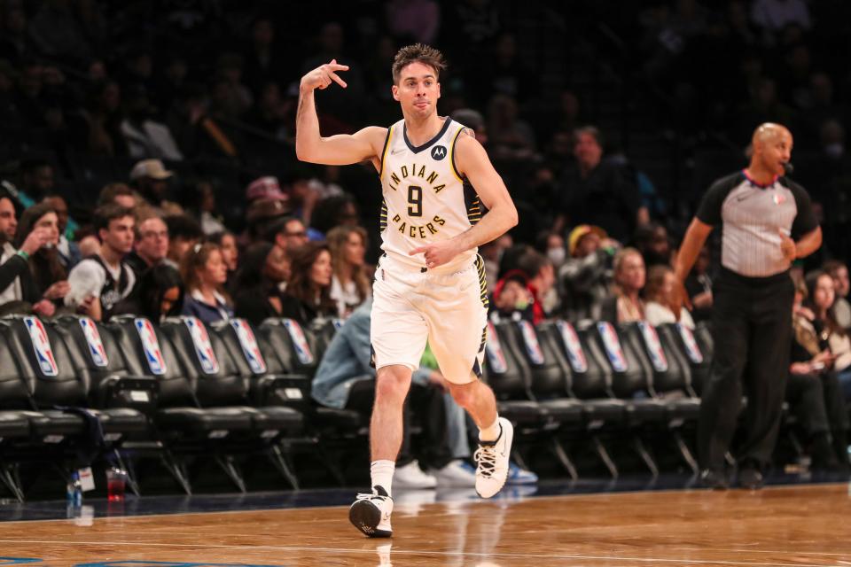 Apr 10, 2022; Brooklyn, New York, USA;  Indiana Pacers guard T.J. McConnell (9) reacts after making a three point shot in the third quarter against the Brooklyn Nets at Barclays Center. Mandatory Credit: Wendell Cruz-USA TODAY Sports