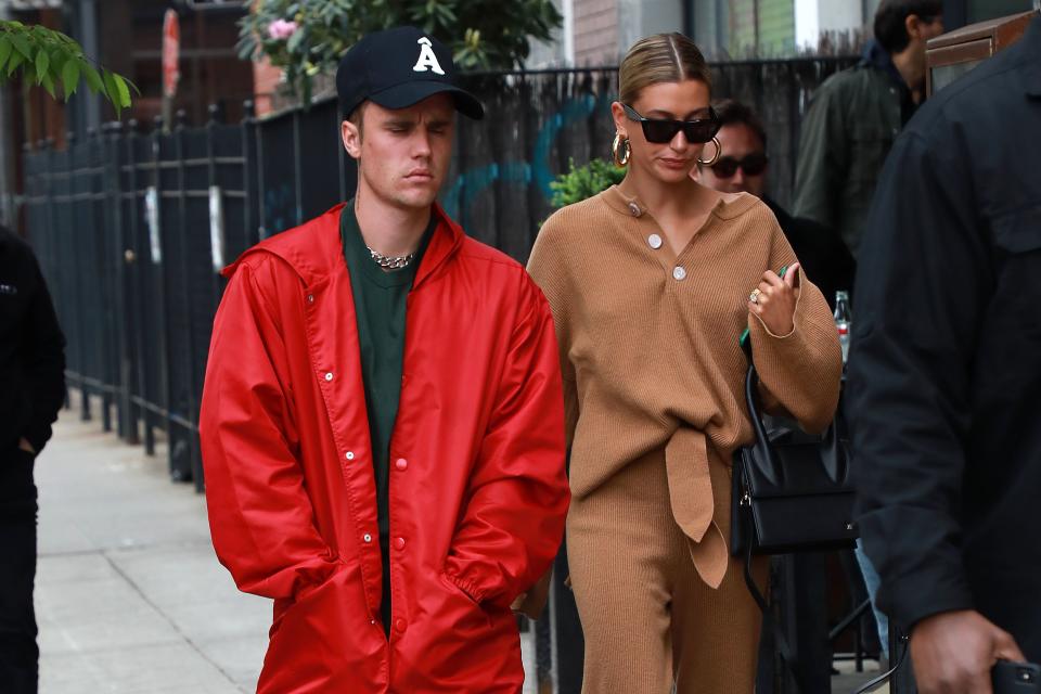 Justin and Hailey Bieber walking