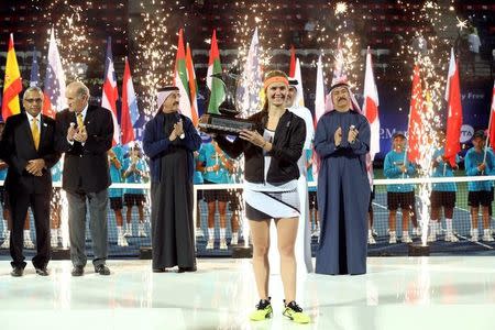 Tennis - Dubai Open - Women's Singles Final - Caroline Wozniacki of Denmark v Elina Svitolina of Ukraine - Dubai, UAE - 25/2/2017 - Elina Svitolina holds her trophy at the end of the match. REUTERS/Stringer