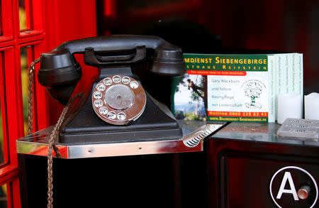 One of the original Trafalgar Square phone boxes is pictured at the curiosities collection called "Little Britain" of Gary Blackburn, a 53-year-old tree surgeon from Lincolnshire, Britain, in Linz-Kretzhaus, south of Germany's former capital Bonn, Germany, August 24, 2017. REUTERS/Wolfgang Rattay