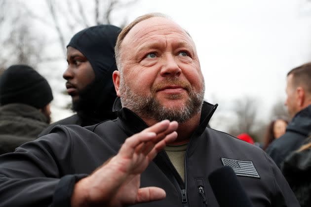 Right-wing radio talk show host and conspiracy theorist Alex Jones speaks to supporters of then-President Donald Trump in front of the Supreme Court ahead of the U.S. Congress certification of the November 2020 election results during protests in Washington nearly a year ago. (Photo: Shannon Stapleton via Reuters)