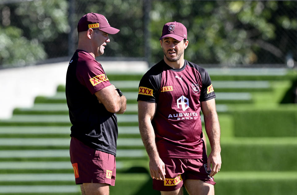 Cameron Smith (pictured left) is a Queensland assistant coach and a Channel Nine commentator. (Photo by Bradley Kanaris/Getty Images)