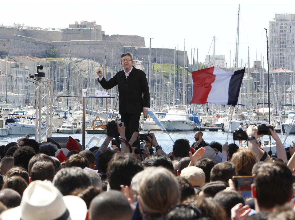 French hard-left presidential candidate, Jean-Luc Melenchon, speaks during a campaign rally in Marseille's Old Port, southern France, Sunday, April 9, 2017. The two-round presidential election is set for April 23 and May 7. (AP Photo/Claude Paris)