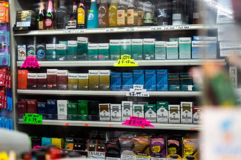 Newport and other cigarettes are seen on a shelf at Big V Party Store on Greenfield Road in Detroit on April 30, 2021.