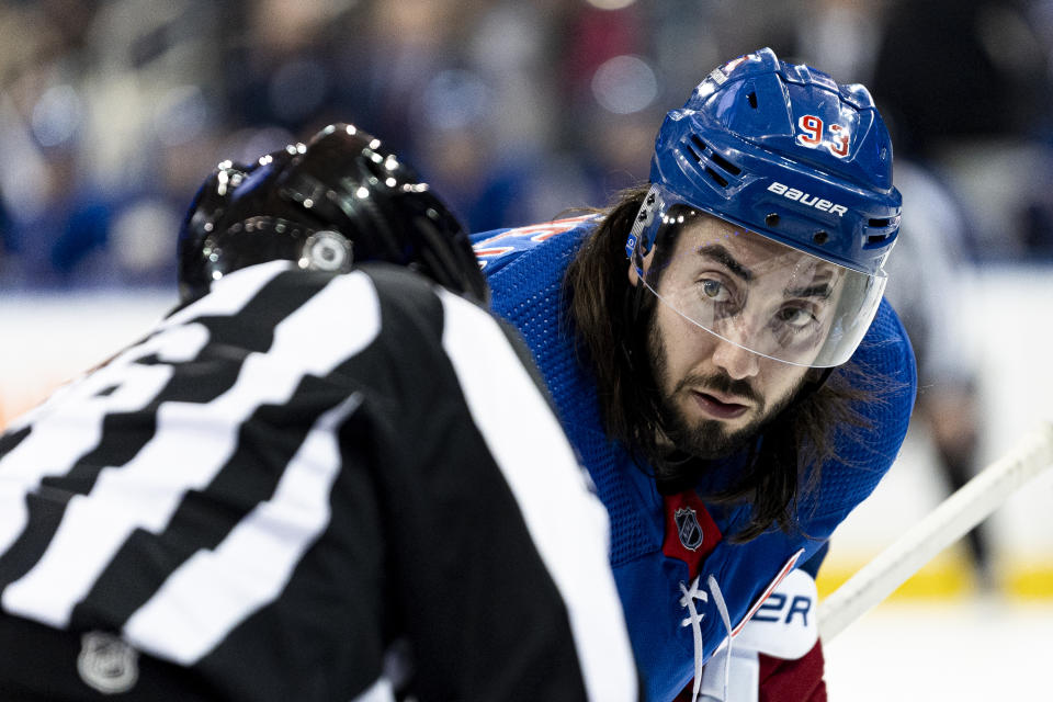 New York Rangers center Mika Zibanejad (93) speaks to the referee during a face off in the second period of an NHL hockey game against the Dallas Stars on Tuesday, Feb. 20, 2024 in New York. (AP Photo/Peter K. Afriyie)