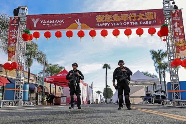 PHOTO: Police officers guard the area near the location of a shooting that took place during a Chinese Lunar New Year celebration, in Monterey Park, California, Jan. 22, 2023. (Mike Blake/Reuters)