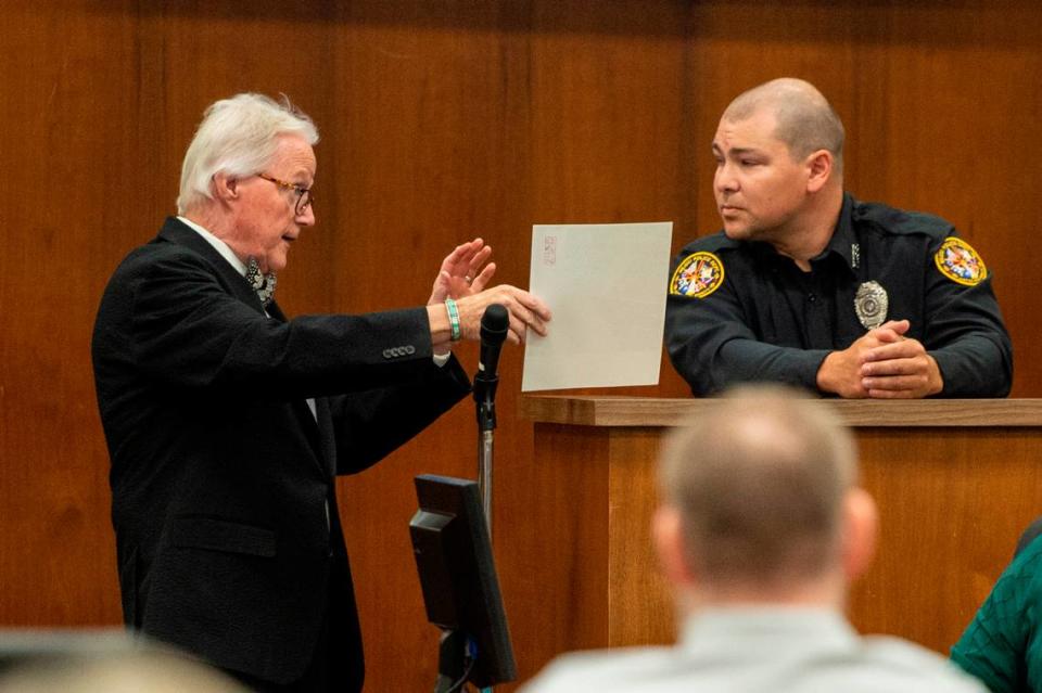 Mount’s attorney Jim Davis questions police officer Eli Humphrey on the witness stand during day one of the trial of Johnny Max Mount for the 2015 murder of Julie Brightwell in Harrison County Court in Biloxi on Tuesday, June 13, 2023.