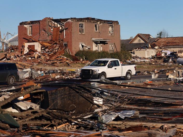 Homes and business are reduced to rubble after a tornado ripped through the area two days prior, on December 12, 2021 in Mayfield, Kentucky.