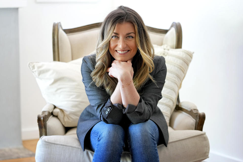 Author T.J. Newman poses for a portrait in Phoenix on May 16, 2023, to promote her latest book, "Drowning.". (AP Photo/Matt York)