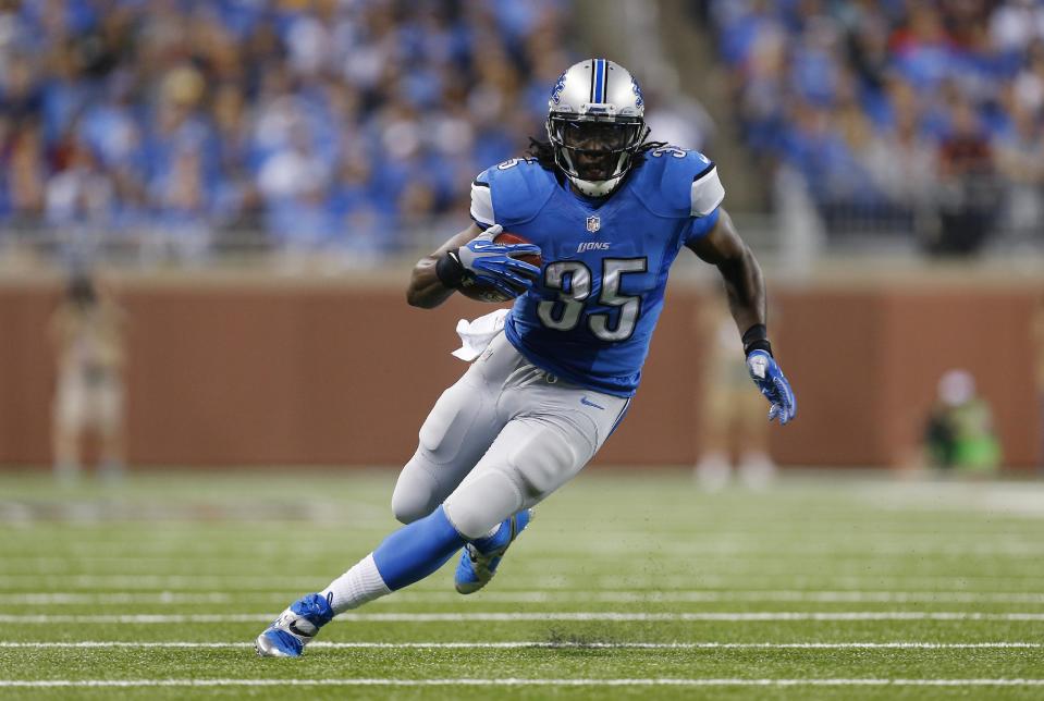 FILE - In this Sept. 29, 2013, file photo, Detroit Lions running back Joique Bell runs during the first quarter of an NFL football game against the Chicago Bears in Detroit. The Detroit Lions achieved one of their top goals this offseason by retaining Bell according to a person familiar with the negotiations. (AP Photo/Paul Sancya, File)