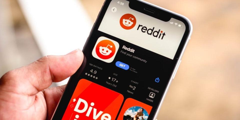 In this photo illustration the Reddit logo in App Store seen displayed on a smartphone screen.