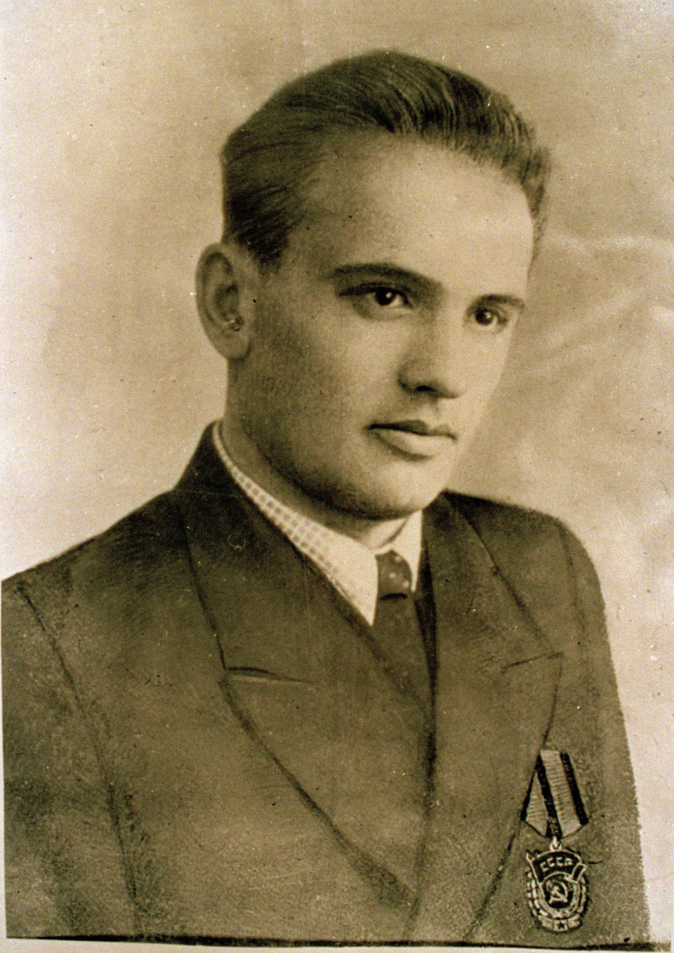 FILE - In this undated photo obtained from the Kommsomol Young Communist League, Mikhail Gorbachev poses for a picture at the age of 19, wearing the Red Banner of Labor medal he received for driving a harvest combine on the plains of southern Russia. Russian news agencies are reporting that former Soviet President Mikhail Gorbachev has died at 91. The Tass, RIA Novosti and Interfax news agencies cited the Central Clinical Hospital. (Kommsomol, Young Communist League via AP, File)