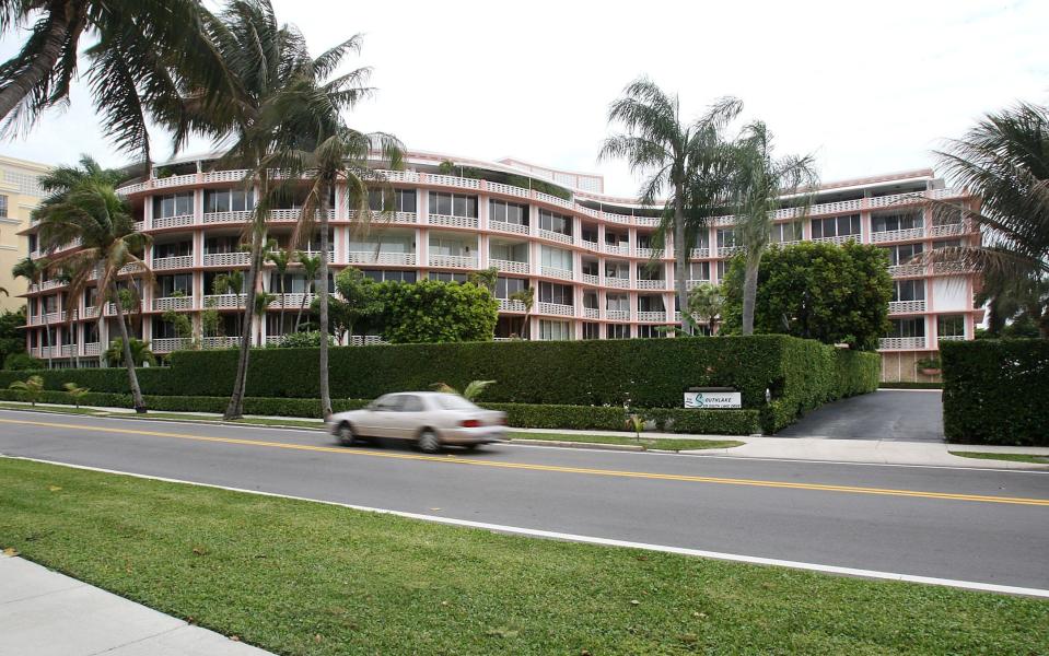 Property records show that Rudy Giuliani owns a condominium in the Southlake, a lakefront condominium overlooking the Palm Beach Marina in Midtown Palm Beach. The snake-shaped building is seen here in a photo taken several years ago.