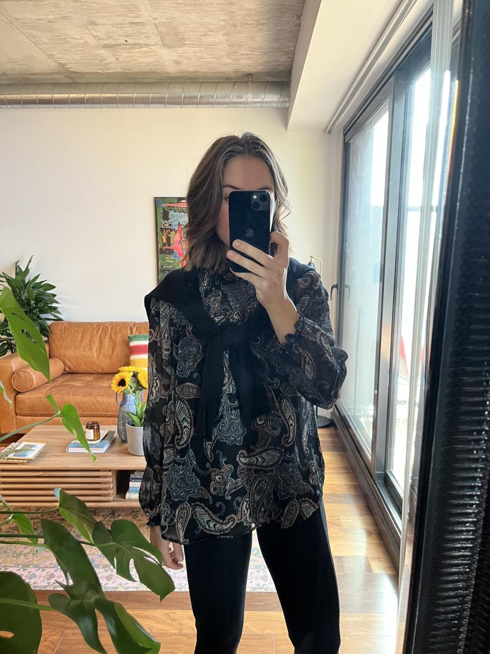 What I'm wearing: Northern Reflections Smocked Printed Blouse, Soft Knit Mock Neck Sweater. and Everyday Active Seamed Legging (Photo via Kayla Kuefler)

