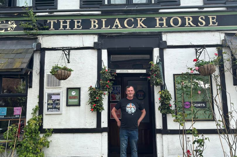 Operator Andrew Edmundson outside The Black Horse pub, Croston, Lancashire