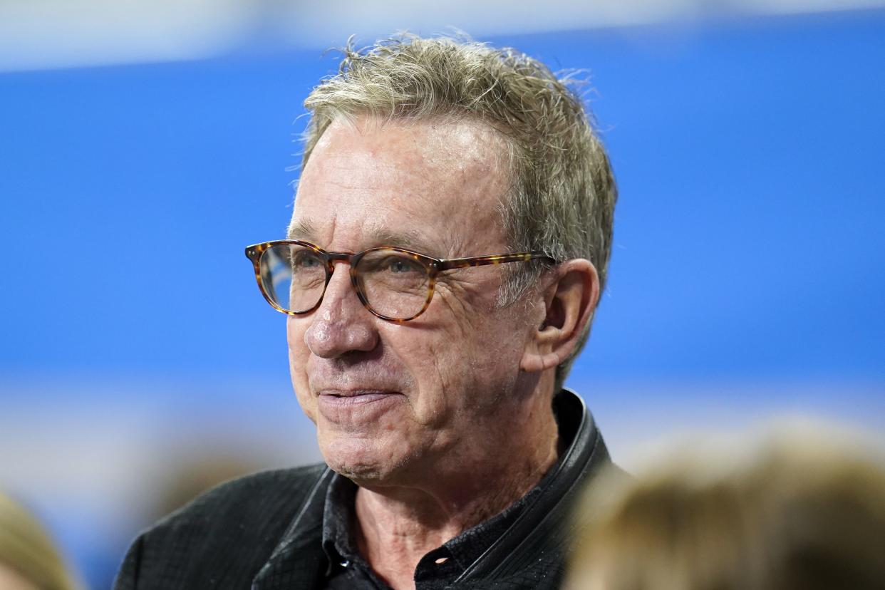 Actor Tim Allen watches before an NFL football game between the Chicago Bears and Detroit Lions in Detroit, Thursday, Nov. 25, 2021. 