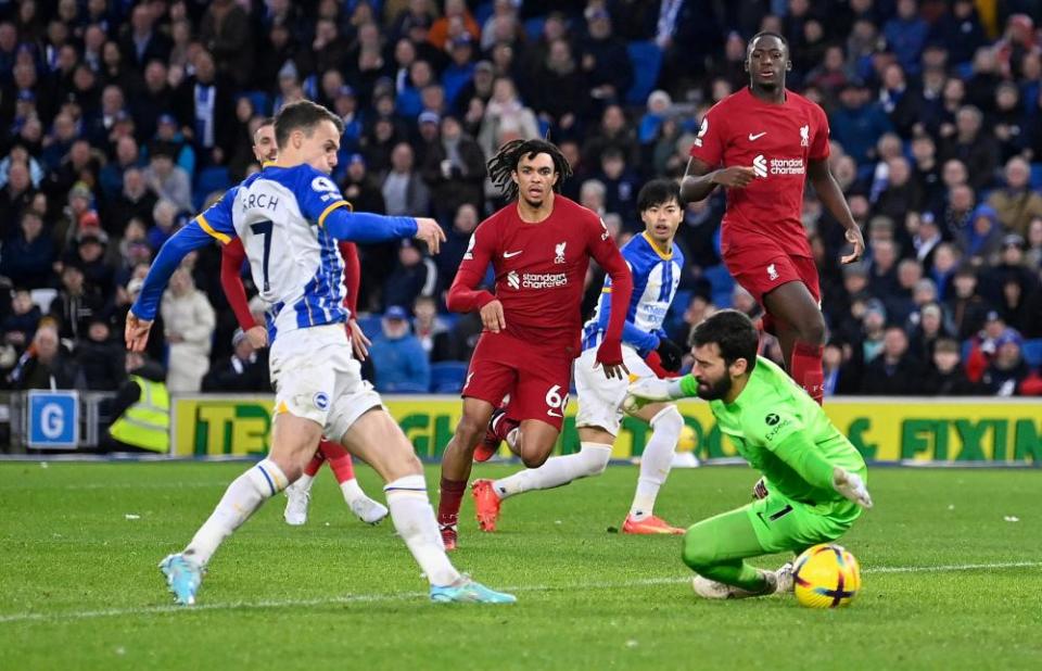 Solly March beats Allison in Brighton’s victory over Liverpool earlier this month.