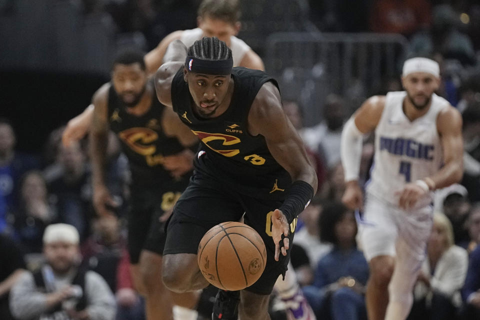 Cleveland Cavaliers guard Caris LeVert (3) takes the ball up the court in the first half of Game 7 of an NBA basketball first-round playoff series against the Orlando Magic, Sunday, May 5, 2024, in Cleveland. (AP Photo/Sue Ogrocki)