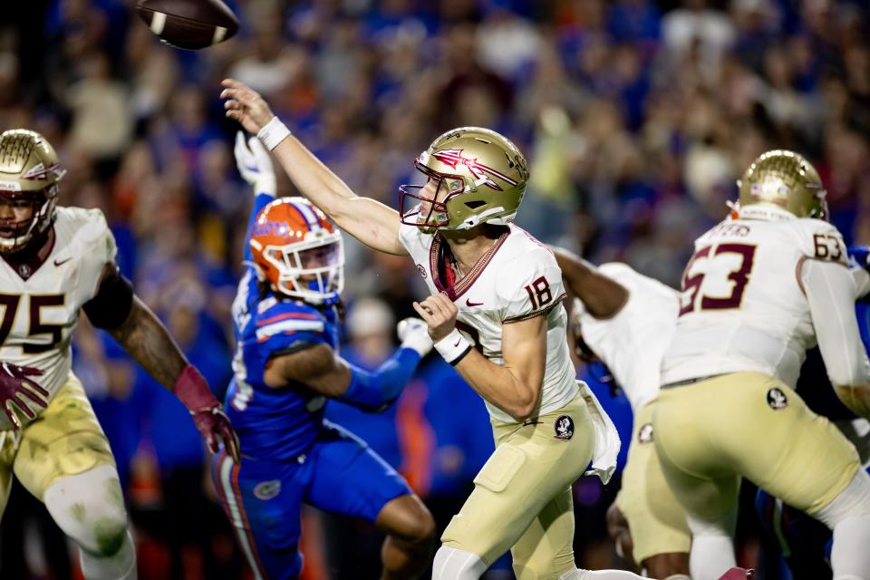 Florida State Seminoles quarterback Tate Rodemaker (18) throws the ball during the second half against the Florida Gators at Steve Spurrier Field at Ben Hill Griffin Stadium in Gainesville, FL on Saturday, November 25, 2023. [Matt Pendleton/Gainesville Sun]