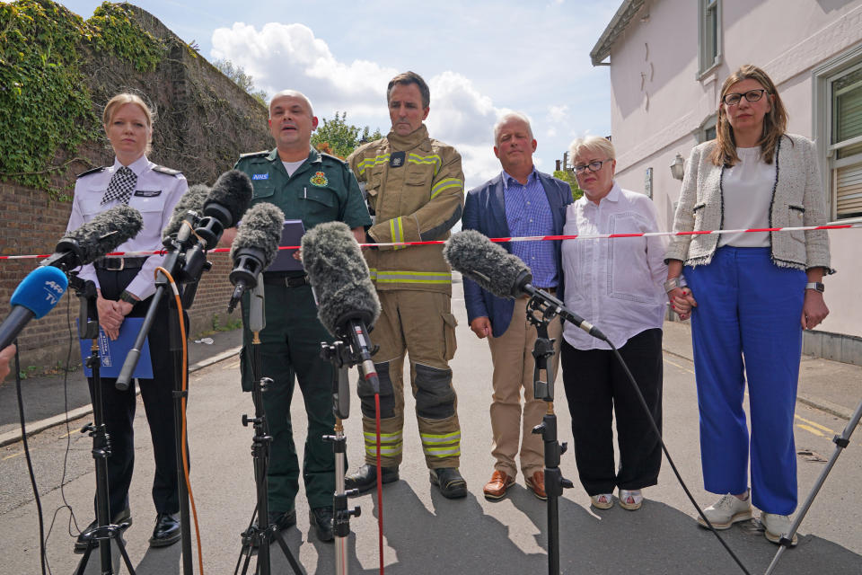  Metropolitan Police Detective Chief Superintendent Clair Kelland, Chief Paramedic Dr John Martin from the London Ambulance Service, Andrew Pennick, London Fire Brigade and school governor John Tucker, speak to the media near the scene. (PA)