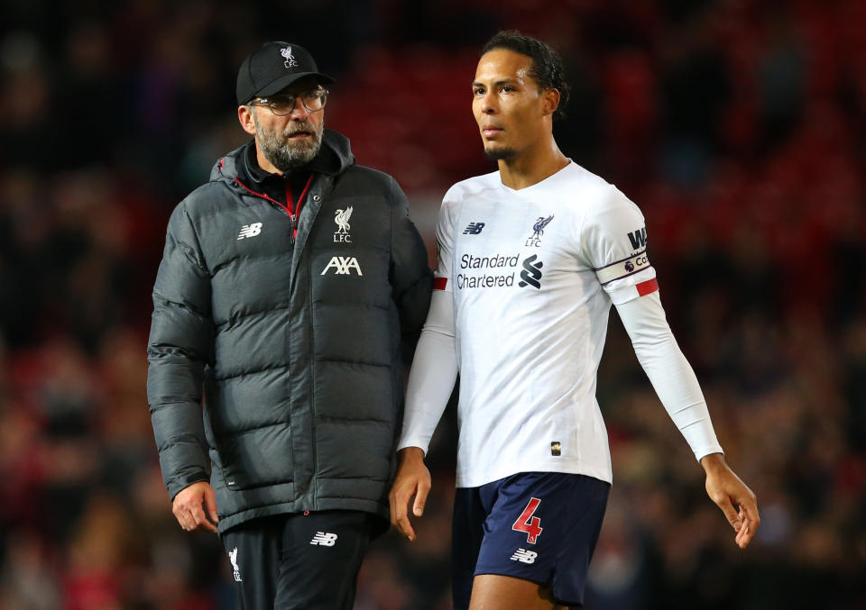 Jurgen Klopp, Virgil van Dijk and Liverpool have a healthy advantage atop the Premier League right now, but where might they slip up? (Photo by Alex Livesey/Getty Images)