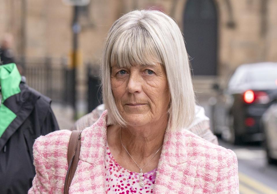 Jane Midgley, the mother of victim Simon Midgley, arrives at Paisley Sheriff Court on Friday (Jane Barlow/PA) (PA Wire)