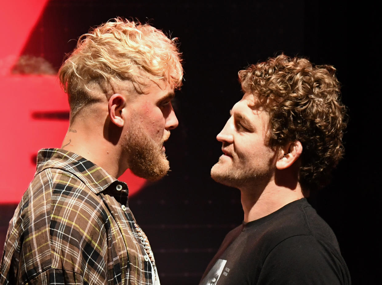 LAS VEGAS, NEVADA - MARCH 26:  Jake Paul (L) and Ben Askren face off during a news conference for Triller Fight Club's inaugural 2021 boxing event at The Venetian Las Vegas on March 26, 2021 in Las Vegas, Nevada. Paul and Askren will face each other in the main event that will take place on April 17, 2021, at Mercedes-Benz Stadium in Atlanta.  (Photo by Ethan Miller/Getty Images)