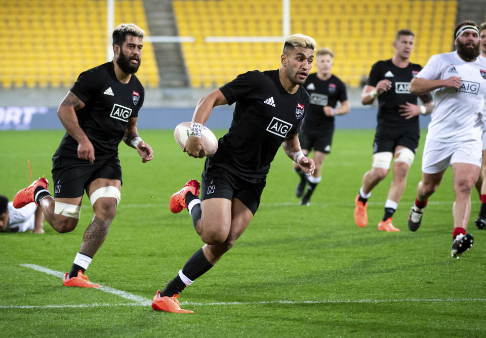 Reiko Ioane runs in to score a try during the North vs South rugby game in Wellington, New Zealand, Saturday, Sept. 5, 2020. The All Blacks which will be named Sunday, Sept 6. (Elias Rodriguez/Photosport via AP)