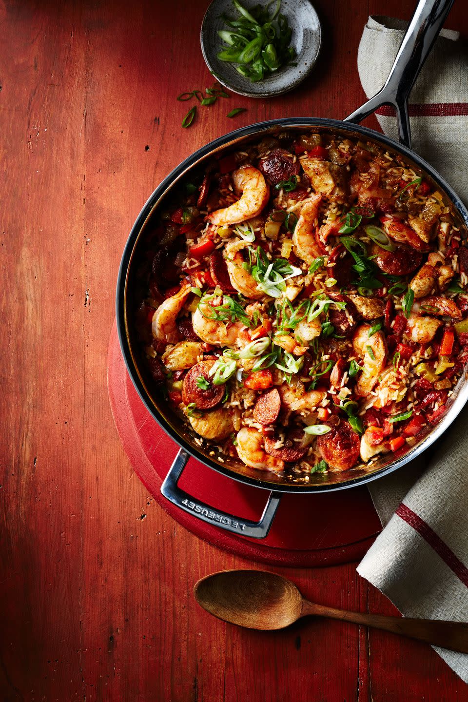 <p>This dish comes from 18th century Spanish settlers in Louisiana, who tried to replicate their familiar paella. The result mixes in French and African influences, and is completely delicious. </p><p>Get the <strong><a href="https://www.womansday.com/food-recipes/food-drinks/recipes/a12523/jambalaya-recipe-wdy0314/" rel="nofollow noopener" target="_blank" data-ylk="slk:Jambalaya recipe;elm:context_link;itc:0;sec:content-canvas" class="link ">Jambalaya recipe</a> </strong>from Woman's Day. </p>