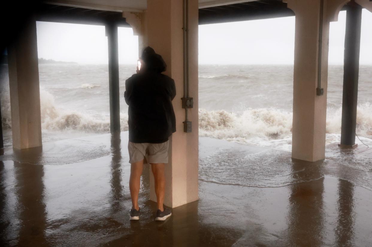 Joey Larsen checks on his neighborhood as high winds, rain and storm surge from Hurricane Debby inundate the area on August 05, 2024, in Cedar Key, Florida (Getty Images)