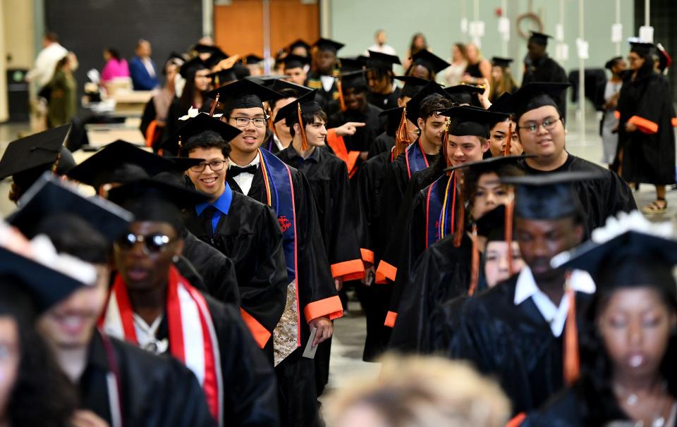 WORCESTER - Graduates proceed to North High's commencement at the DCU Center Wednesday, June 8, 2022.