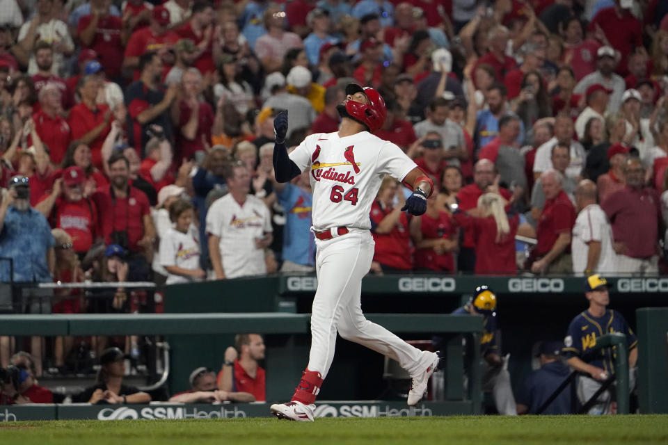 St. Louis Cardinals' Jose Rondon looks skyward as he rounds the bases after hitting a solo home run during the sixth inning of a baseball game against the Milwaukee Brewers Tuesday, Sept. 28, 2021, in St. Louis. (AP Photo/Jeff Roberson)