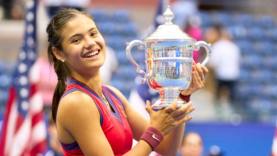 Seen here, Emma Raducanu holds the US Open trophy aloft in 2021.