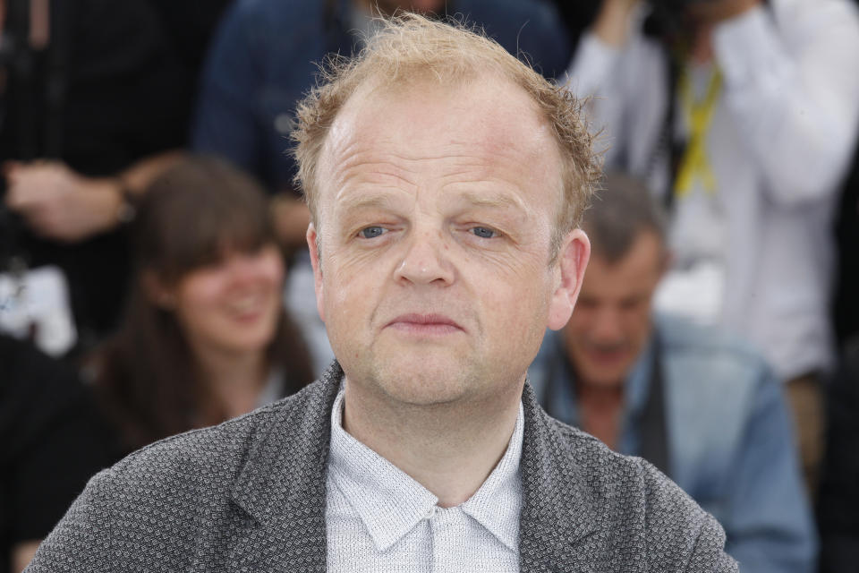 FILE - In this Thursday, May 14, 2015 file photo, actor Toby Jones poses during a photo call for the film Tale of Tales, at the 68th international film festival, Cannes, southern France. The Queen's New Year honors list was annouced Wednesday, Dec. 30, 2020. Actress Lesley Manville, an Oscar nominee for “Phantom Thread,” was named a Commander of the Order of the British Empire, or CBE. Actor Toby Jones, whose credits include Dobby in the “Harry Potter” movies, was made an Officer of the Order of the British Empire or OBE, as was writer Jed Mercurio, creator of gripping TV detective series “Line of Duty.” (AP Photo/Lionel Cironneau,file)