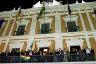 Bolivian Senator Jeanine Anez looks on after she declared herself as Interim President of Bolivia, at the balcony of the Presidential Palace, in La Paz