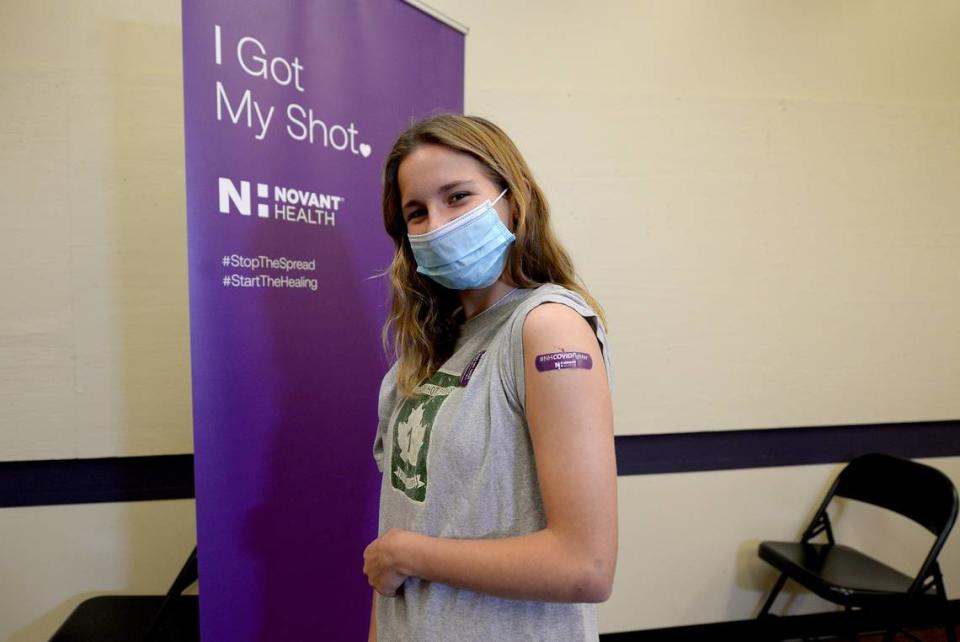 Cassidy Black, 13 years, was the first teenager to receive a COVID vaccination shot on Wednesday, May 12, 2021 at the Novant Health clinic at 6070 East Independence Blvd.