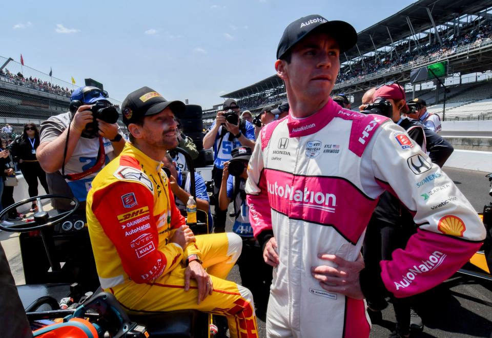Andretti Autosport driver Romain Grosjean (28) and Andretti Autosport driver Kyle Kirkwood (27) stand in pit lane Saturday, May 20, 2023, during first day of qualifying ahead of the 107th running of the Indianapolis 500 at Indianapolis Motor Speedway. 