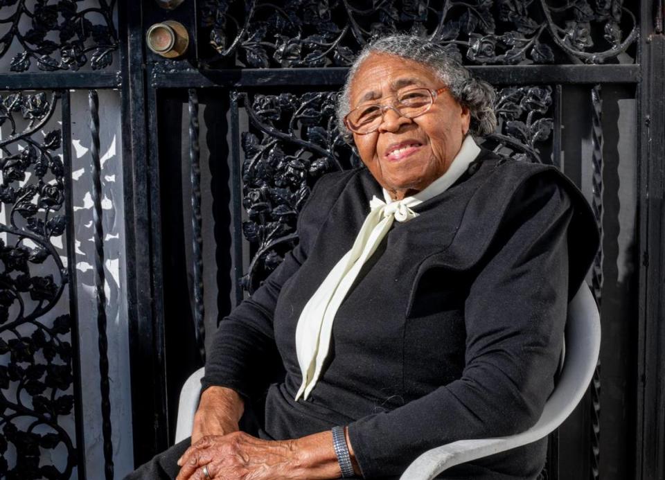 Former educator Nancy Dawkins, who worked for Miami-Dade County Public Schools for over 30 years, sits on the front porch of her home in Liberty City as she explains her role as an activist for the Black Miami communities over the course of her lifetime, on Friday, February 5, 2021.