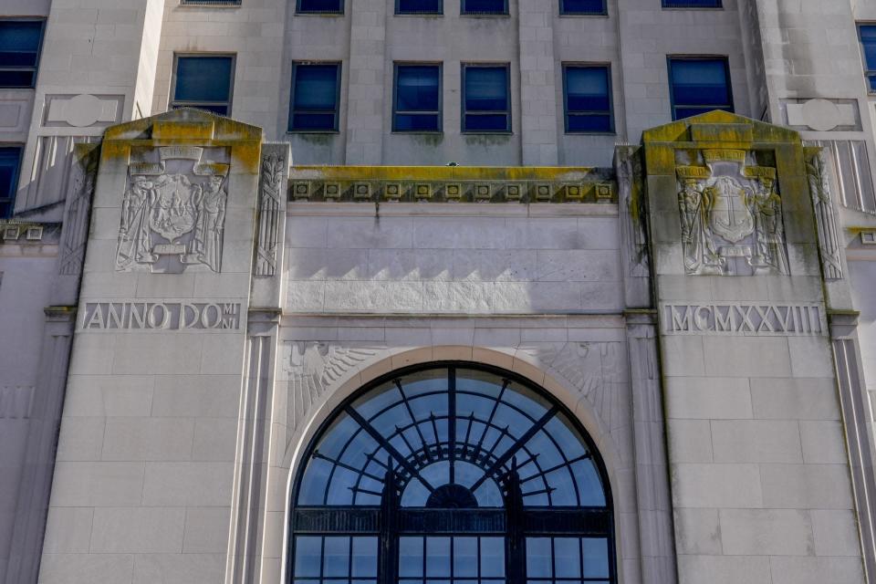 The limestone fa&#xe7;ade of the Industrial Trust Tower, which is affixed to a steel skeleton.