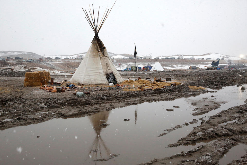 <p>A teepee stands in deep mud as protesters prepare to evacuate the main opposition camp against the Dakota Access oil pipeline, near Cannon Ball, N.D., Feb. 22, 2017. (Photo: Terray Sylvester/Reuters) </p>