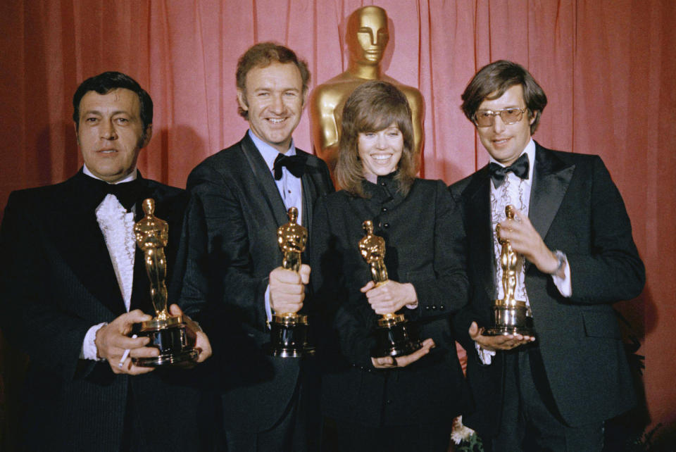 FILE - William Friedkin, winner of the award for best achievement in directing for "The French Connection," from right, Jane Fonda, winner of the best actress award for "Klute," Gene Hackman, winner of the best actor award for "The French Connection" and producer Philip D'Antoni, winner of the award for best picture for "The French Connection," pose in the press room at the Academy Awards, March 27, 1971 in Los Angeles. Friedkin died Monday, Aug. 7, 2023, in Los Angeles, his wife, producer and former studio head Sherry Lansing told The Hollywood Reporter. (AP Photo, File)