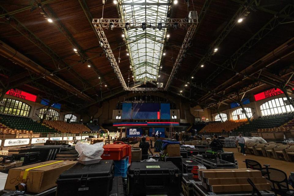 Workers begin to work on transforming the inside of the Cowtown Coliseum for the 2024 MLB Draft in the Fort Worth Stockyards on Thursday.